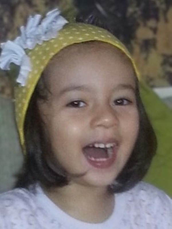 Alba wearing the yellow hat