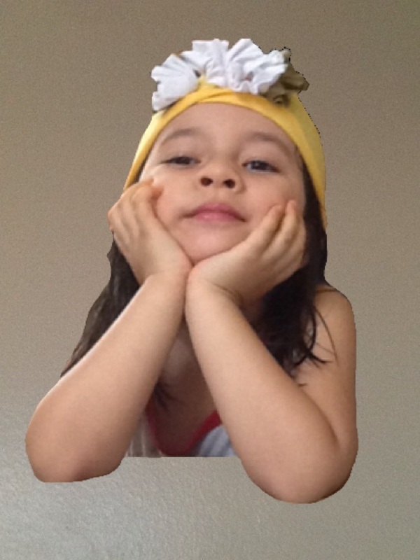 Alba in the yellow hat with her hands on her chin, the background has been removed